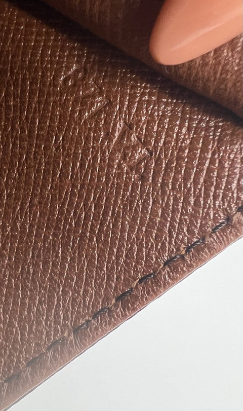 Louis Vuitton Jena Clutch